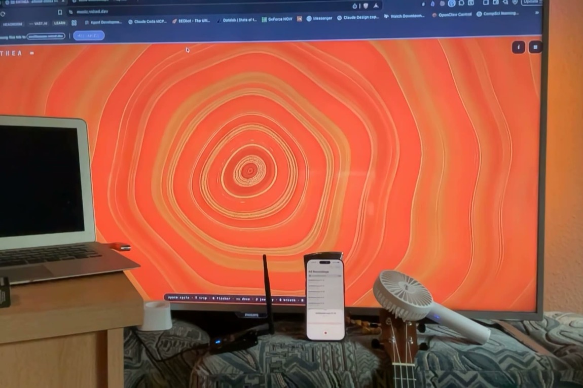 the journey, full-frame — the visualizer folded into a deep-orange agate, rings breathing out from a single bright core